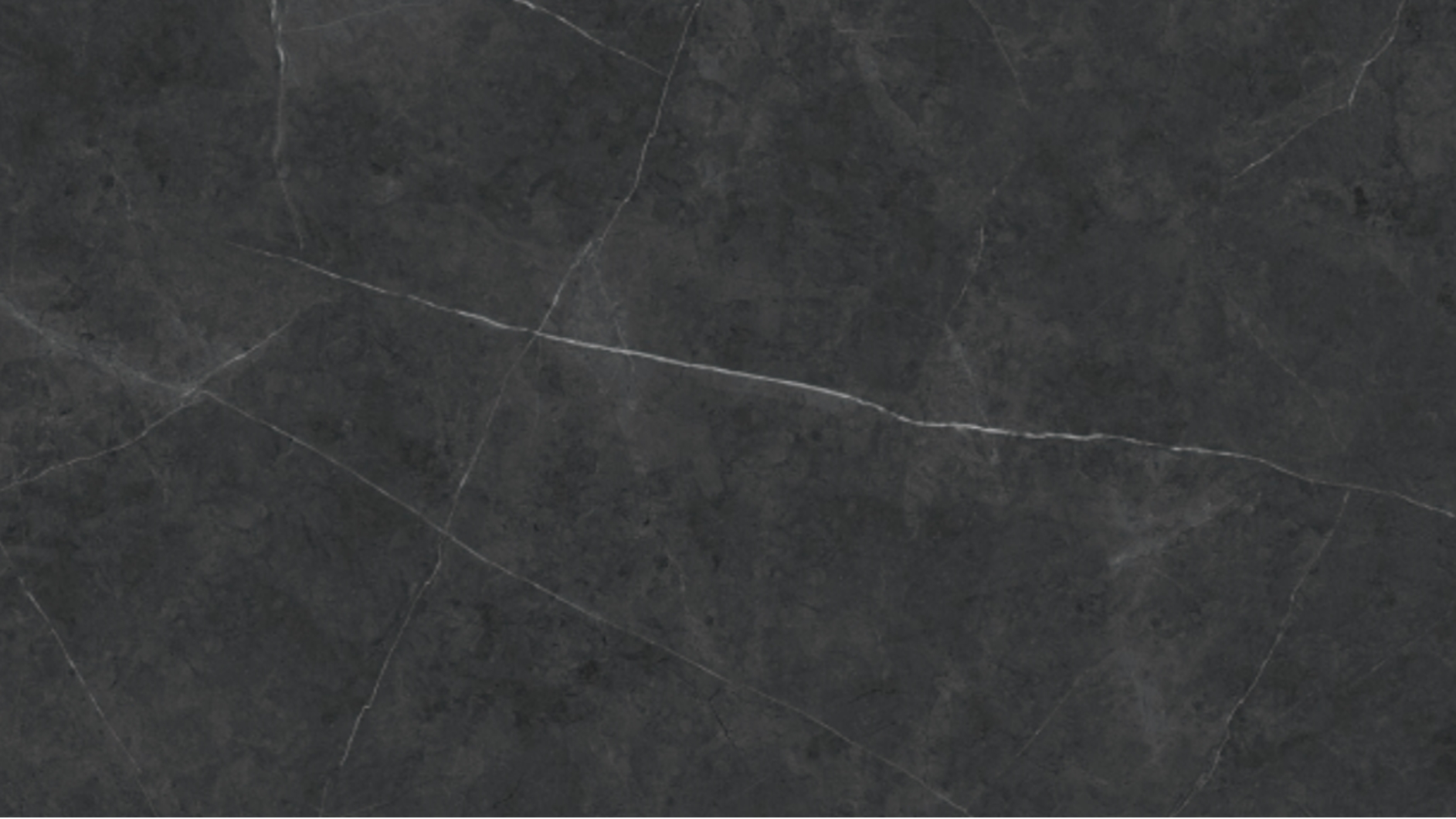 Lámina Pitrea Grey Dark en superficie arquitectónica de lujo