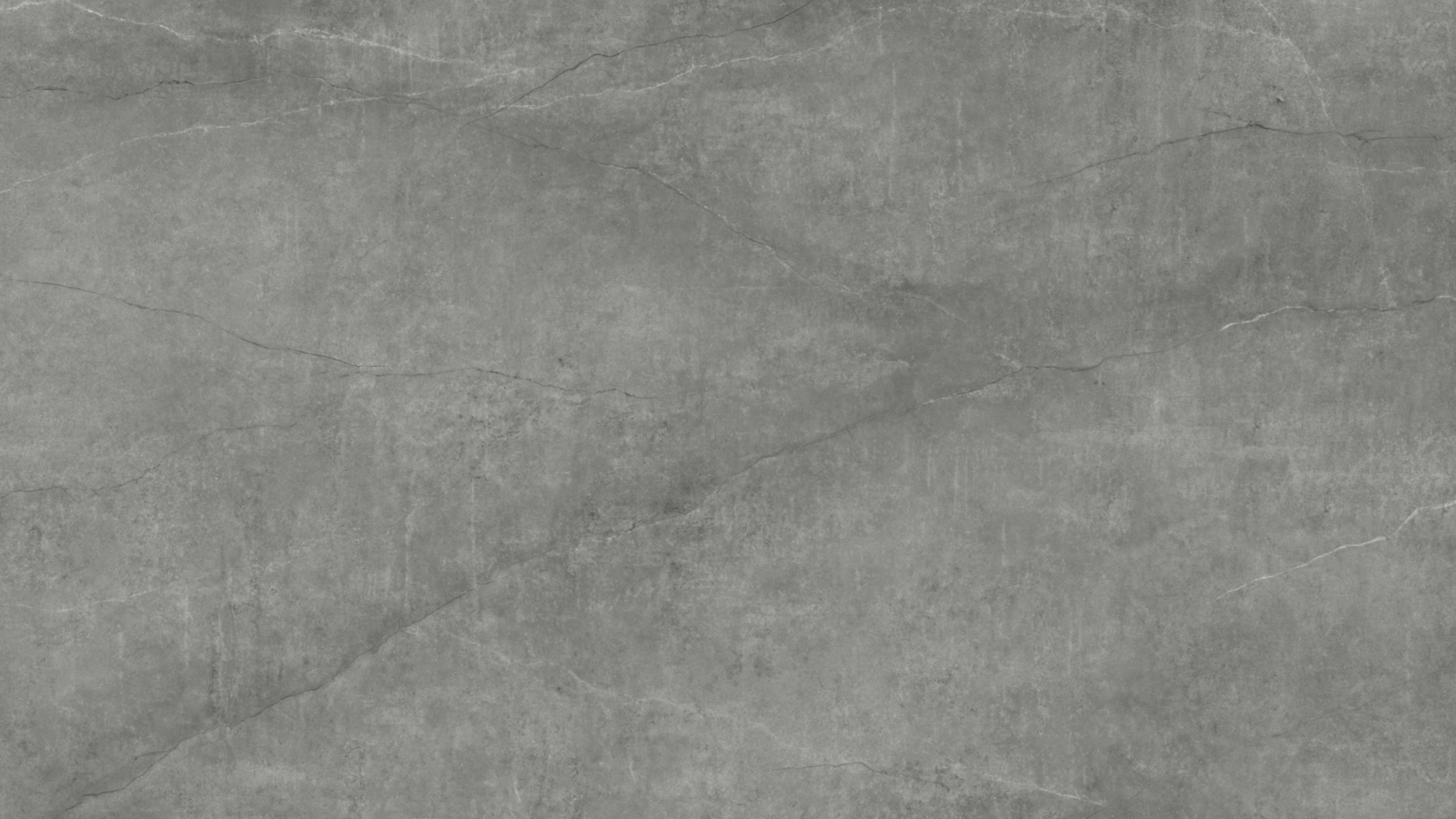 Lámina Pitrea Grey Dark en superficie arquitectónica de lujo