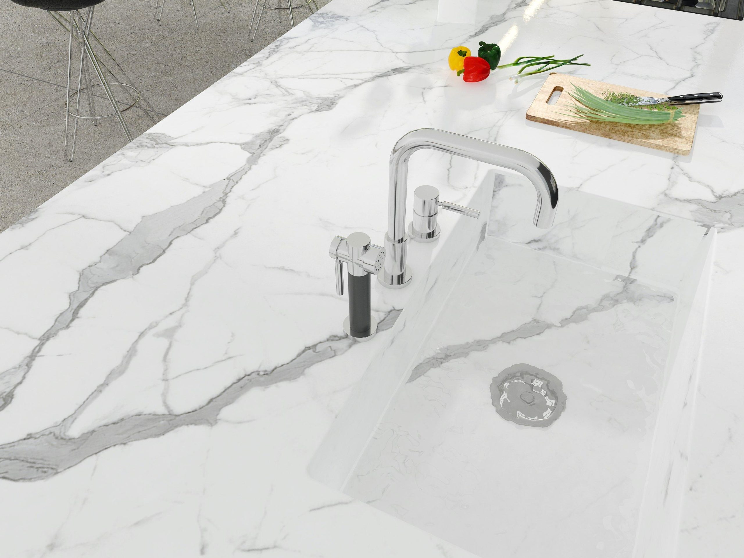 Superficie arquitectónica de lujo en piedra técnica sinterizada instalada en cocina contemporánea