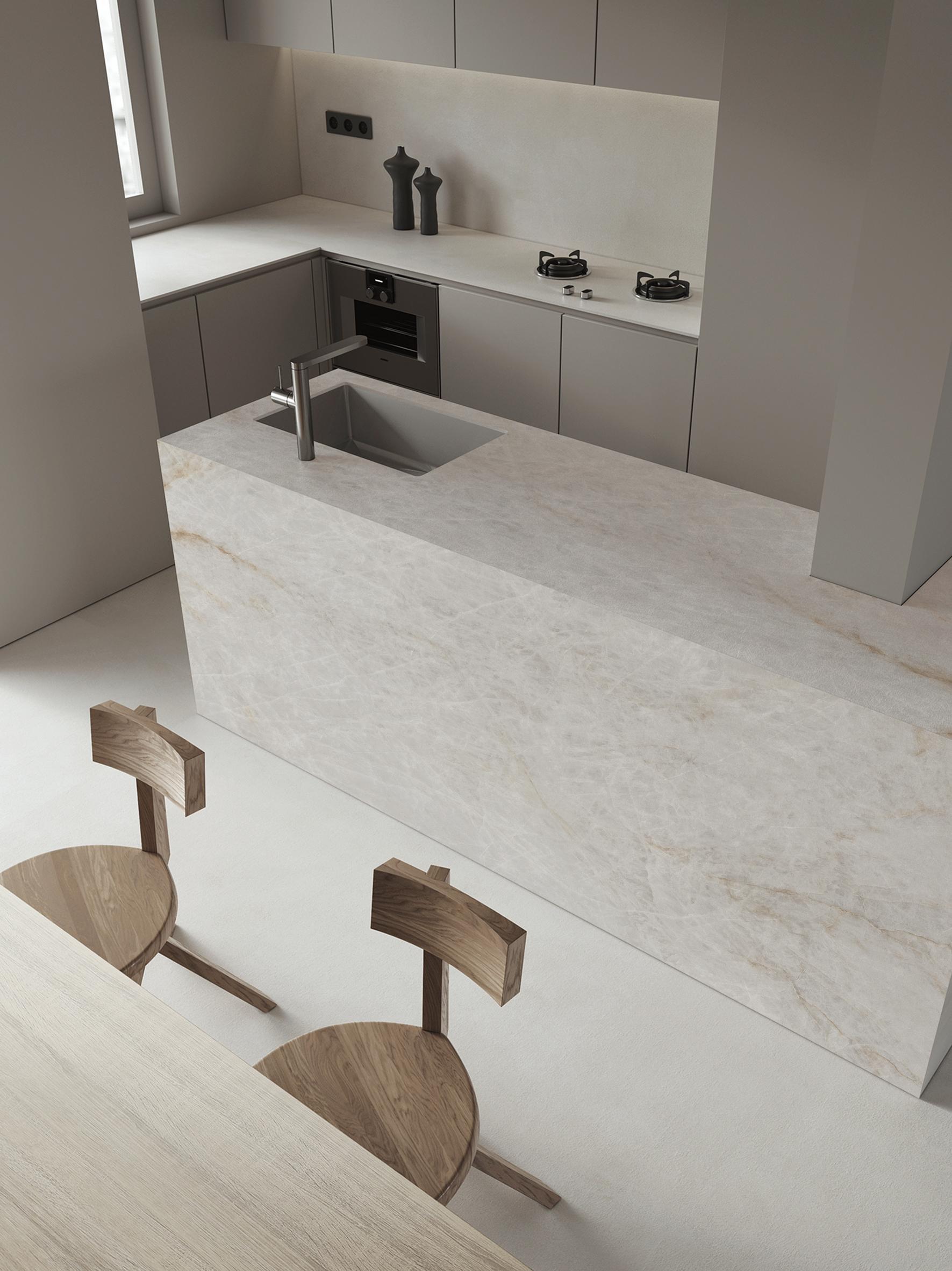 Superficie arquitectónica de lujo en piedra técnica sinterizada instalada en cocina contemporánea